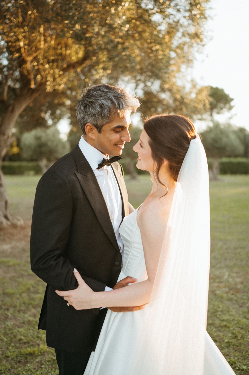 Image may contain Blazer Clothing Coat Jacket Formal Wear Suit Adult Person Wedding Face Head and Photography