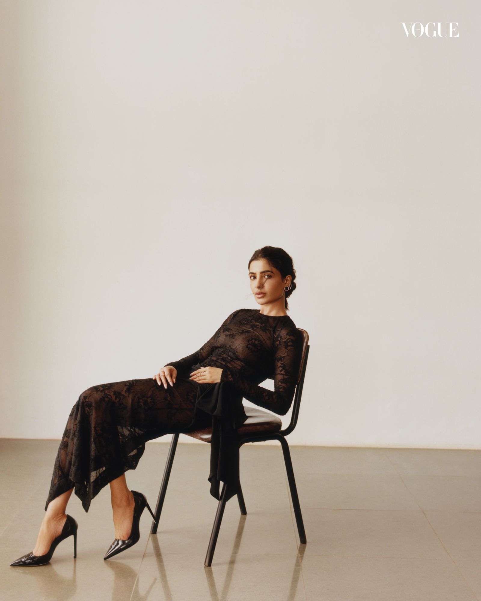 Image may contain Samantha Akkineni Person Sitting Clothing Footwear Shoe High Heel Adult Formal Wear and Dress