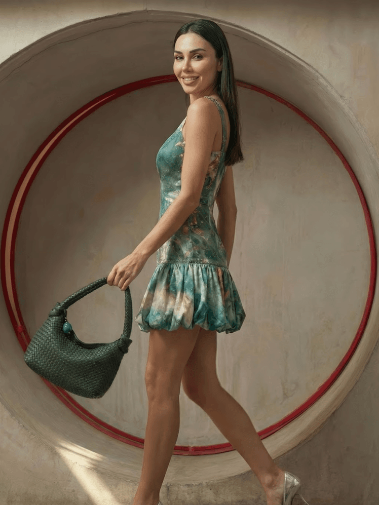 Image may contain Arpi Gabrielyan Accessories Bag Handbag Purse Person Clothing Dress Formal Wear and Miniskirt