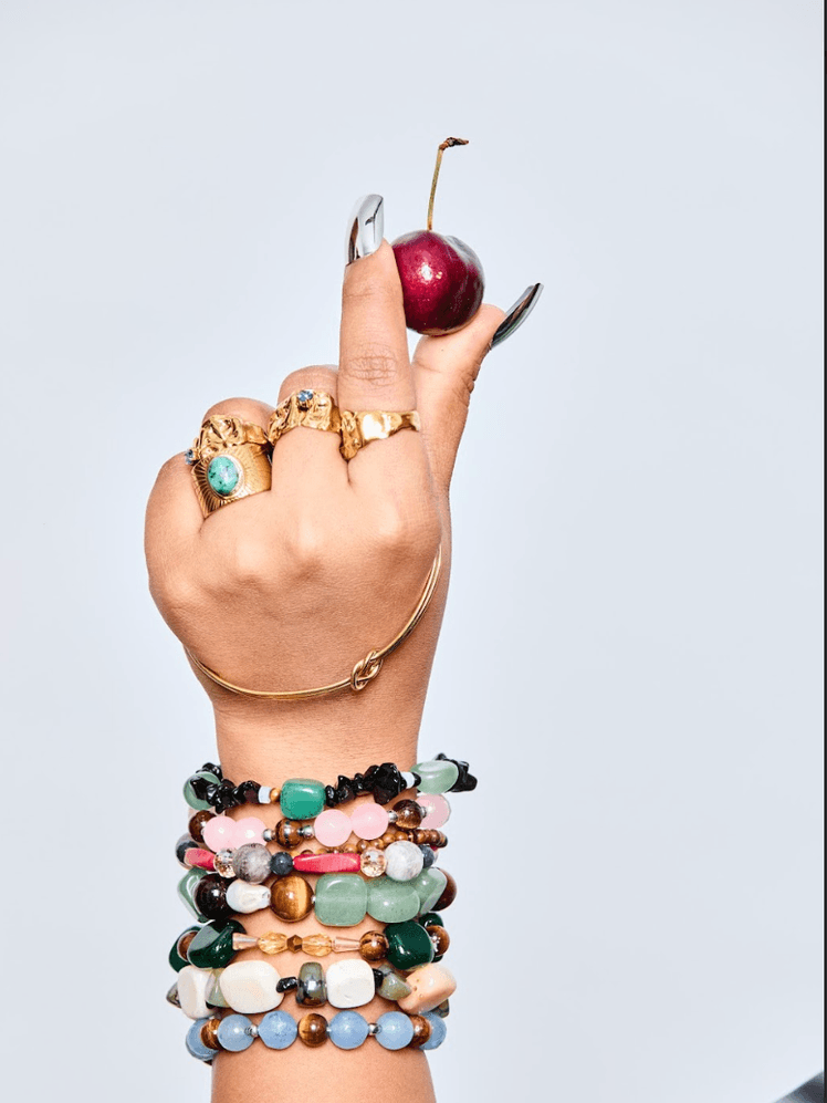 Image may contain Body Part Finger Hand Person Accessories Bracelet Jewelry and Wrist